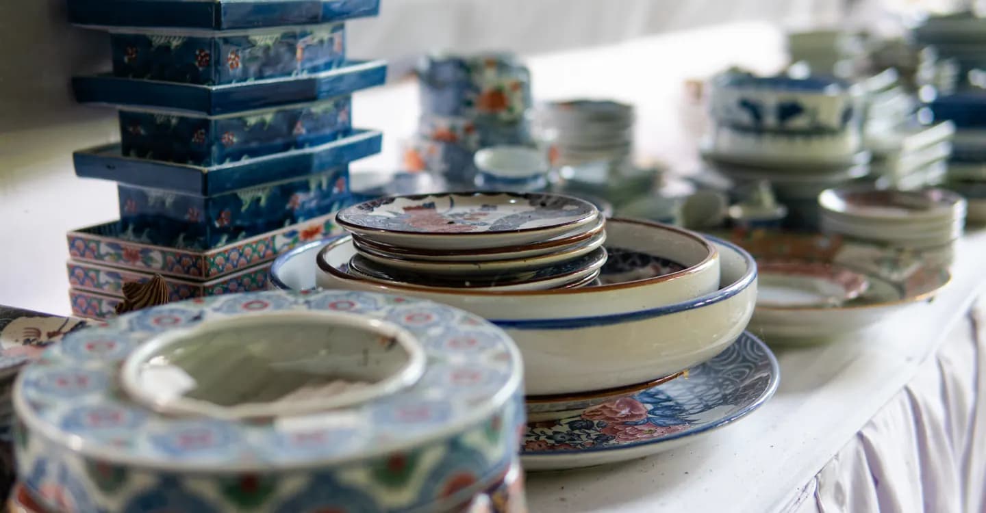 Vintage furniture and household finds arranged inside an estate sale.