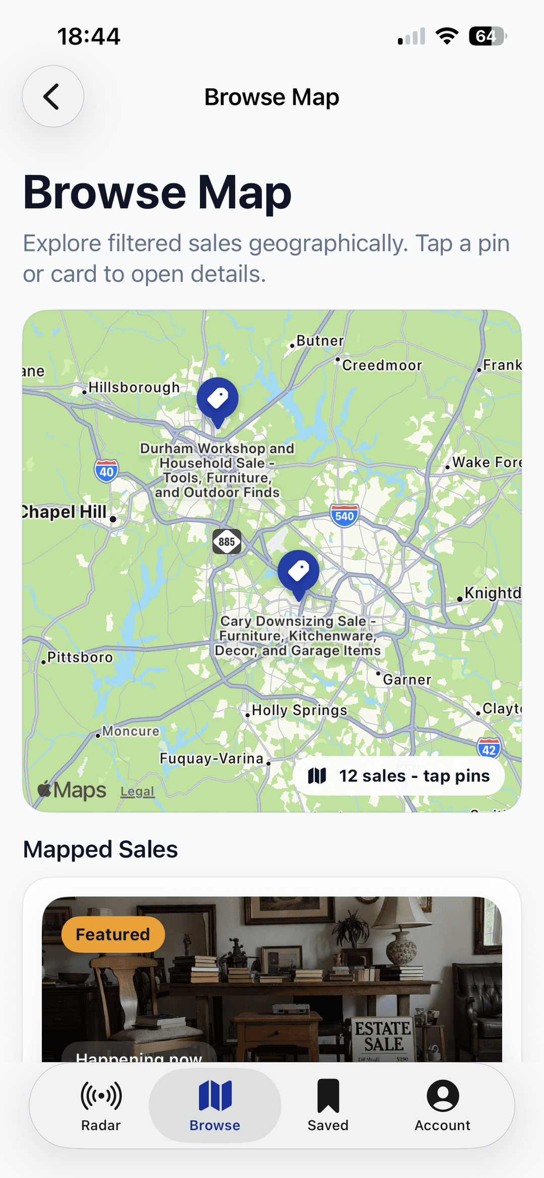 SaleRadar iOS map view showing estate sale pins near a selected area.